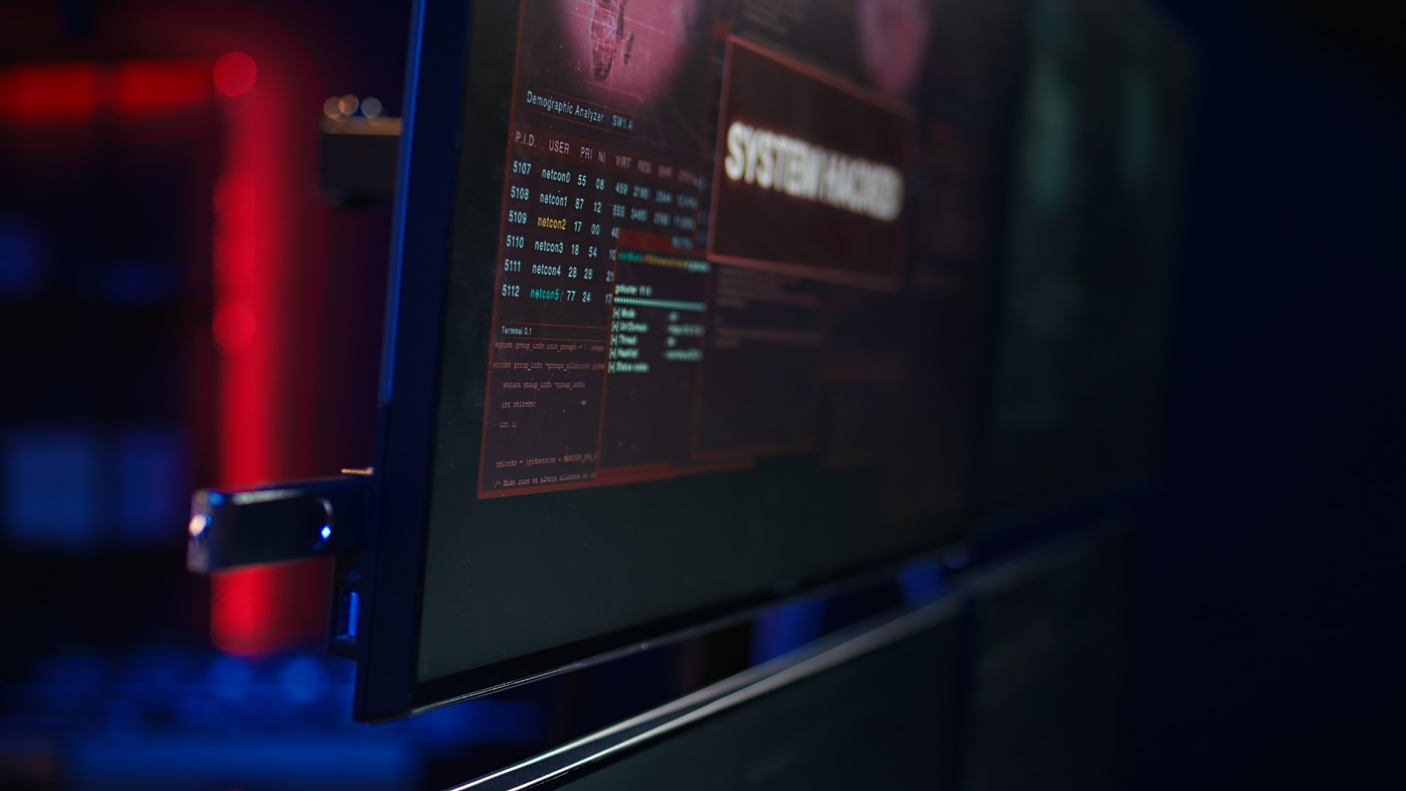 Hacker uploading USB flash drive with stolen data in PC